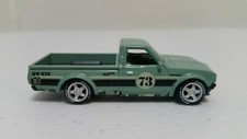 Hotwheels Customized Datsun 620 Pickup with Bridgestone Real Rider Wheels