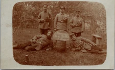 WWI German Armistice Soldiers w/ Flowers RPPC Real Photo Postcard Battle Photo