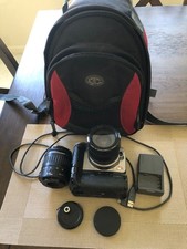 Canon REBEL XT camera with extra lens and accessoroes