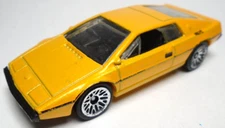 2014 HOT WHEELS LOTUS ESPRIT S1 YELLOW / ORANGE 1:64 DIECAST 2 3/4" CAR W/ BLACK