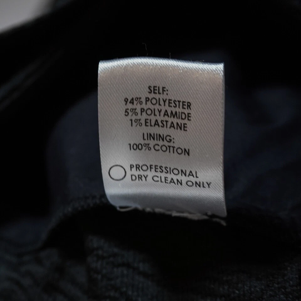 Pantalones negros cortos de pierna recta texturizados bordados con flores florales Rosie Assoulin Foto 3 de 4