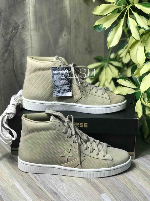 khaki leather converse