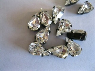 24 Vtg. Swarovski Pear shapes 4 hole sew ons in 10x6mm Crystal/Black. #4300