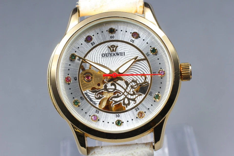 Reloj automático para hombre casi como nuevo OUYAWEI dorado plata piedras coloridas de JAPÓN Foto 3 de 4