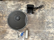 Black roborock S7 Robot Vacuum with base, charger and extra parts
