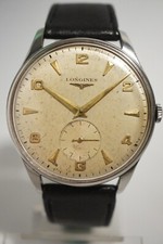LONGINES OVERSIZE (38 mm) EN ACIER, CALIBRE 27M, 1954