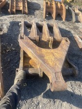 excavator thumb
