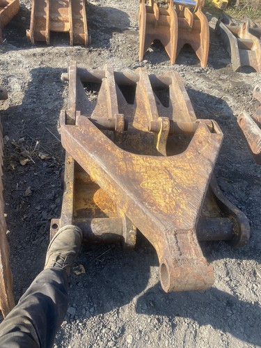 excavator thumb