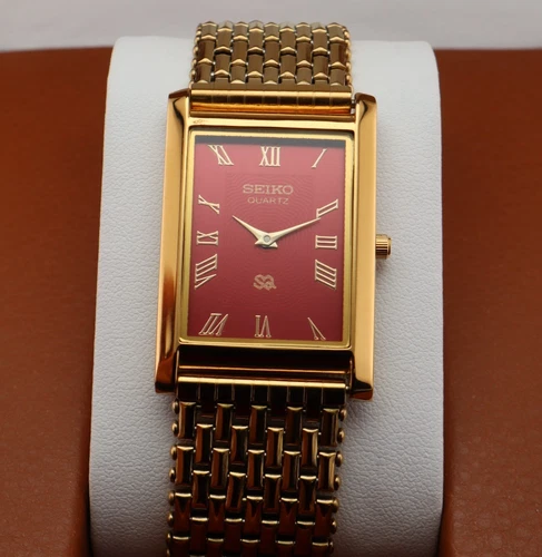 Vintage Seiko Slim Quartz Men's Wrist Watch Red  Dial with Gold Bracelet.