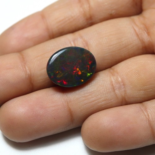 4,9 ct 15 x 11,9 mm natürlicher AAA auffälliger Multi Feuer geräuchter schwarzer äthiopischer Opal oval - Bild 9 von 10