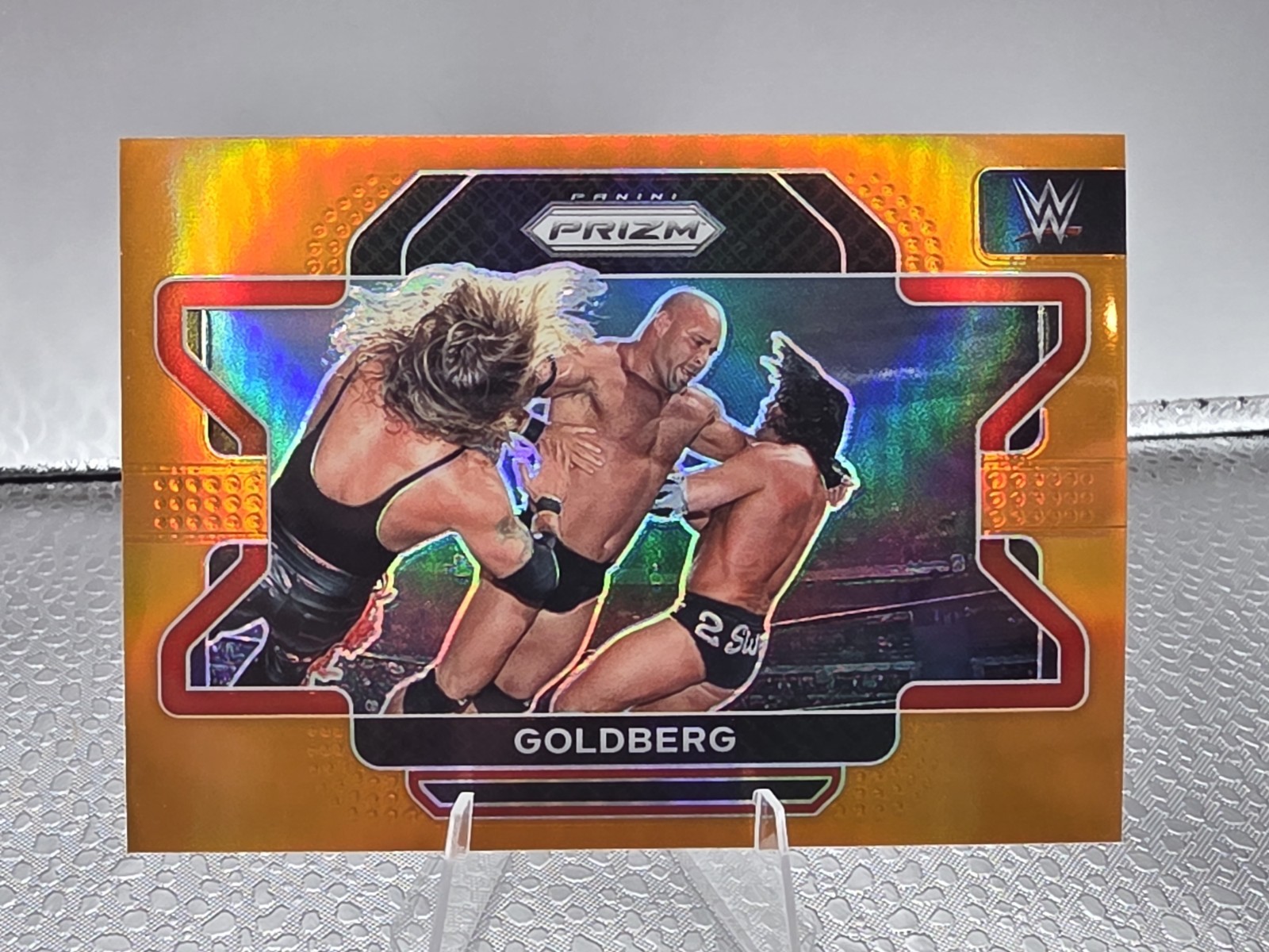 2022 Panini Prizm WWE #33 GOLDBERG Orange Prizm #/99