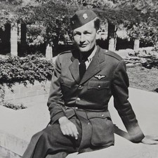Vintage B W Photo Snapshot Young Man WWII Air Force Soldier Sitting Smirking