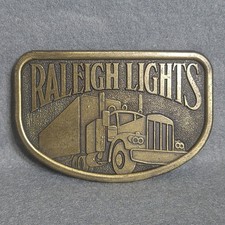 Vintage Raleigh Lights Cigarettes Trucker Belt Buckle Gold Tone Metal Semi Truck