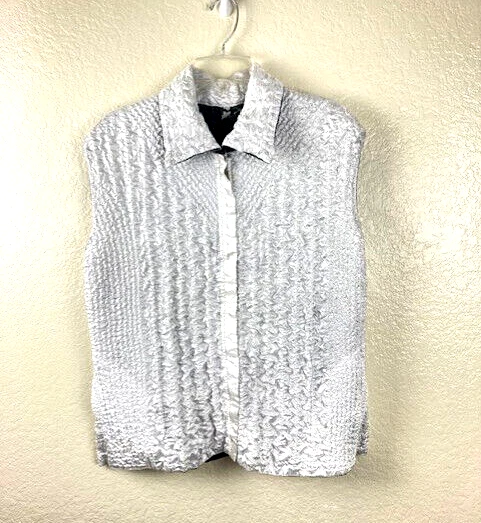 Chaleco acolchado reversible floral blanco y negro sin mangas UBU para mujer talla L Foto 3 de 4