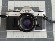 Canon AE-1 Silver with FD 50mm f/1.8 Lens. Amazing condition. FILM TESTED.