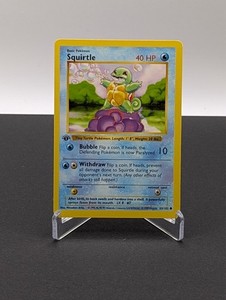 ポケモンカードゲーム Squirtle 1st edition shadow less 1999 Pokemon Squirtle #63 Grey Stamp Shadowless 1st Edition PSA 7