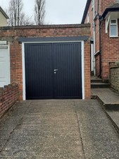 Supplied and fitted Black Novoferm Berkley design side hung garage door