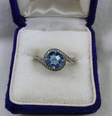 Pandora Sterling silver ring signed ALE blue faceted solitaire RS accents 7.5
