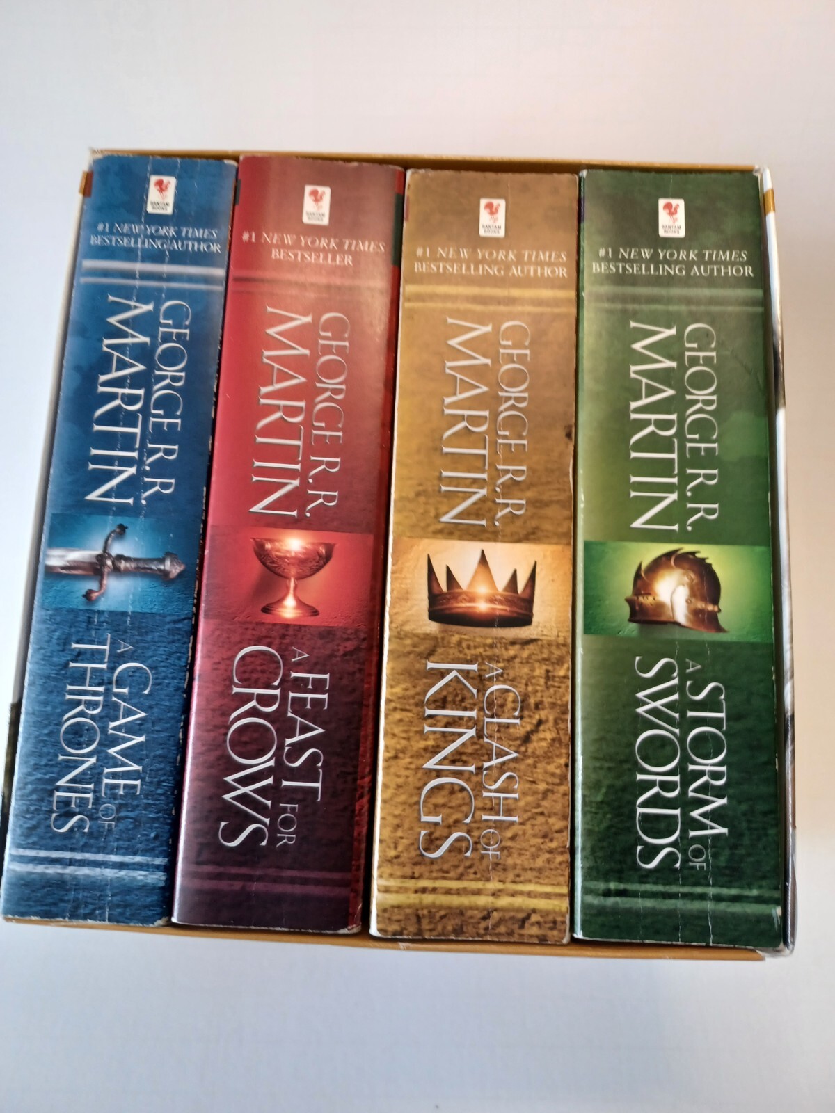 George R R Martin A Game of Thrones 4-Book Set with Culture Mag Cutout-image