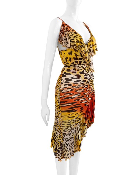 Rare vintage Roberto Cavalli "Freedom" dress. Made from 100% silk, this vibrant