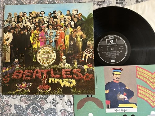 The BEATLES "SGT PEPPERS LONELY HEARTS CLUB BAND" UK Vinyl w/cutout page psychEX