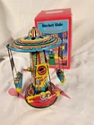 VINTAGE SCHYLLING ROCKET RIDE CAROSEL TIN TOY WITH BOX