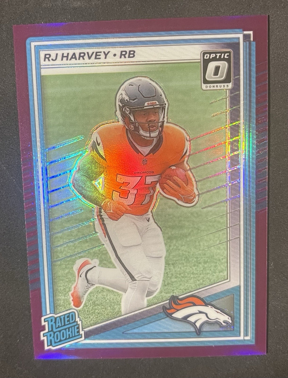 2025 Panini Donruss - Optic Preview - RJ Harvey Rated Rookie Purple /50 Broncos