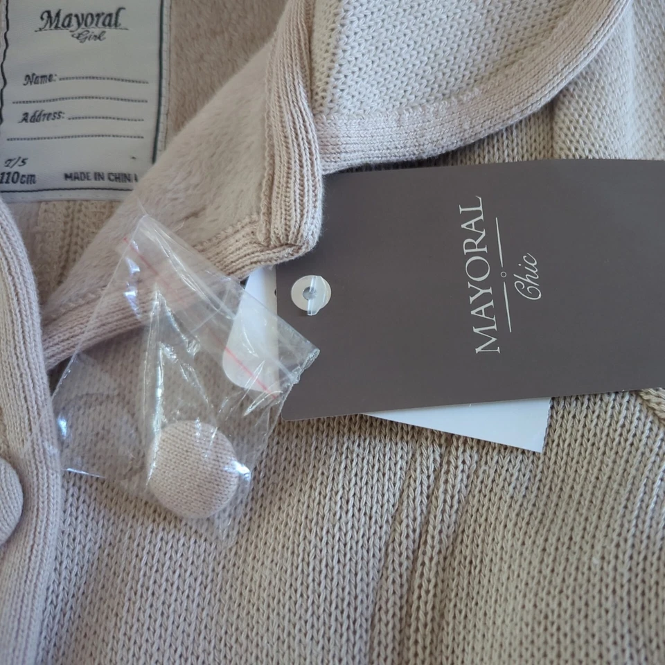 Abrigo Mayoral Chic Niñas Tejido Guisante Beige Talla 5. Bolsillos con botones de punto forrados de vellón Foto 4 de 4