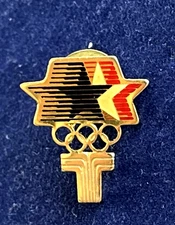 1984 LOS ANGELES OLYMPIC GAMES PIN BADGE/ TRANSAMERICA ~ STARS IN MOTION/SPONSOR
