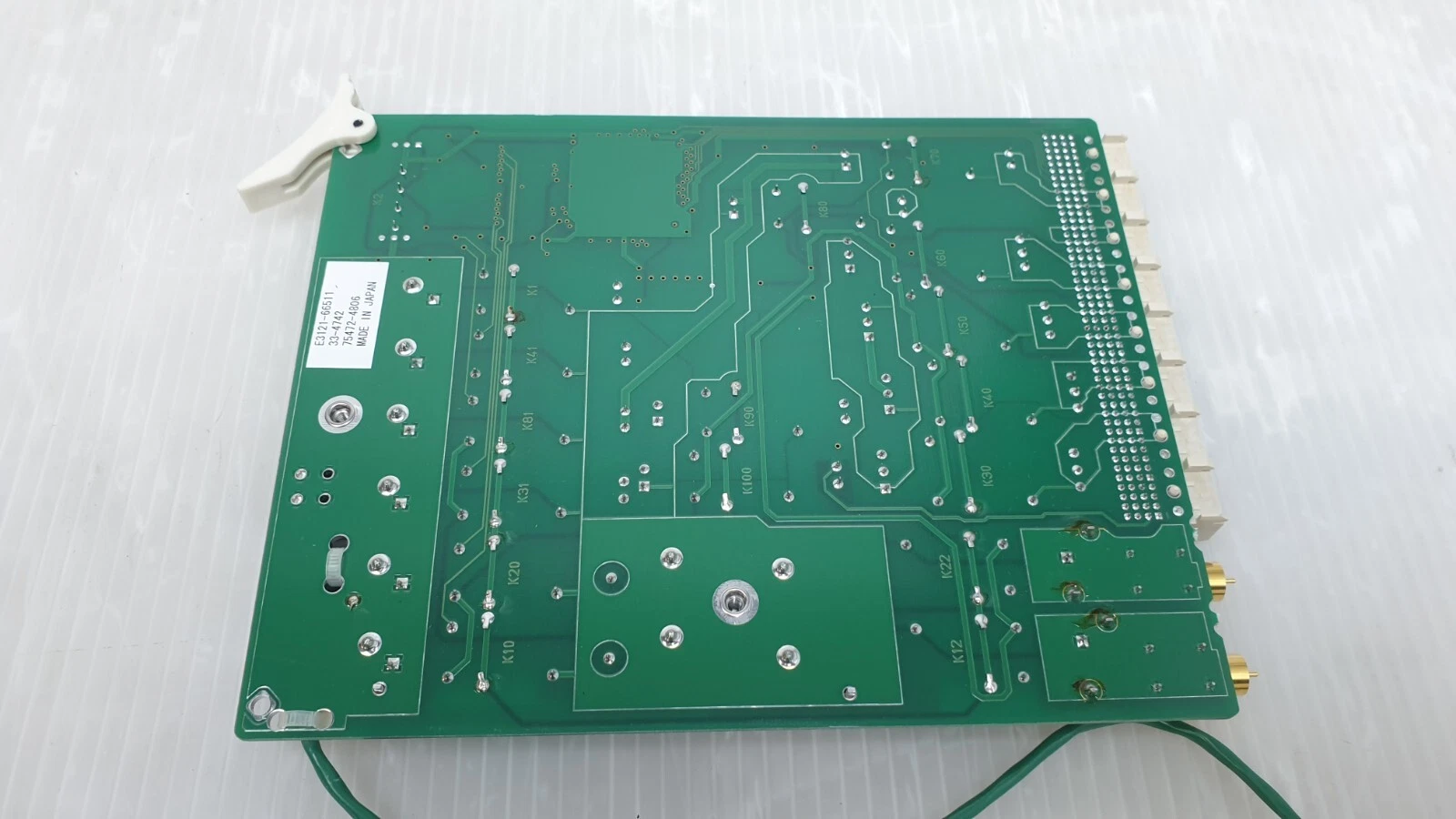 Solder side of the E3121-66511 board with white part number label