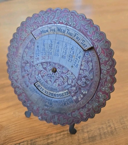 VTG Brass Sarna Perpetual Desk Dial Calendar Easel Back Radial Floral Design