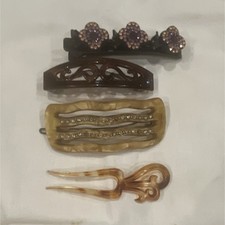 The brown Barrett is missing the small knob to clamp onto.