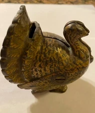 ANTIQUE 1900s A.C. WILLIAMS CAST IRON TURKEY PENNY STILL BANK, 3 3/8 INCHES TALL