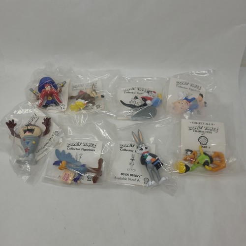 Complete 8 pc set of the 1990 Shell Gasoline  Looney Tunes Daffy Duck Is Opened - Afbeelding 1 van 14