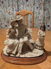 A. Belcari Arnart Dear Sculpture Couple on Bench Child w Flowers 1984 Figurine