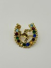 Vintage Horseshoe Kokopelli Brooch Pin Gold Tone Multicolor Rhinestone Good Luck
