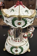 Centre de table musical Carrousel Père Noël renne porcelaine vacances Noël.