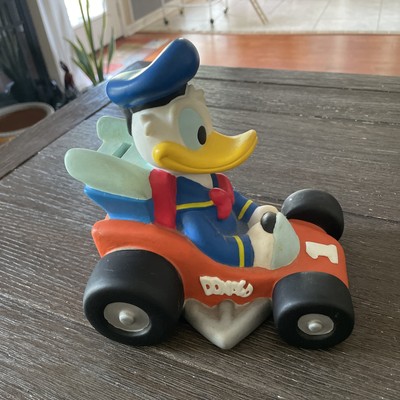 RARE VINTAGE BULLYLAND DISNEY DONALD DUCK WITH RACING CAR MONEY PIGGY BANK  NEW.