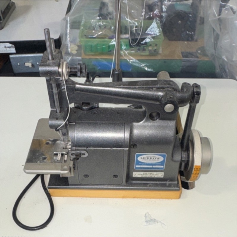 Used once Merrow 18-E Industrial crochet Sewing Machine with table and motor