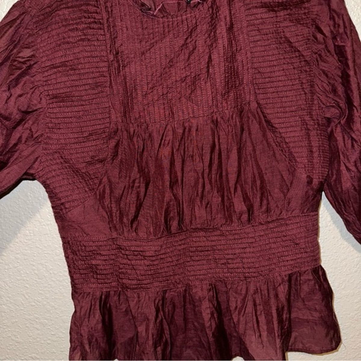 something navy pleated peplum top