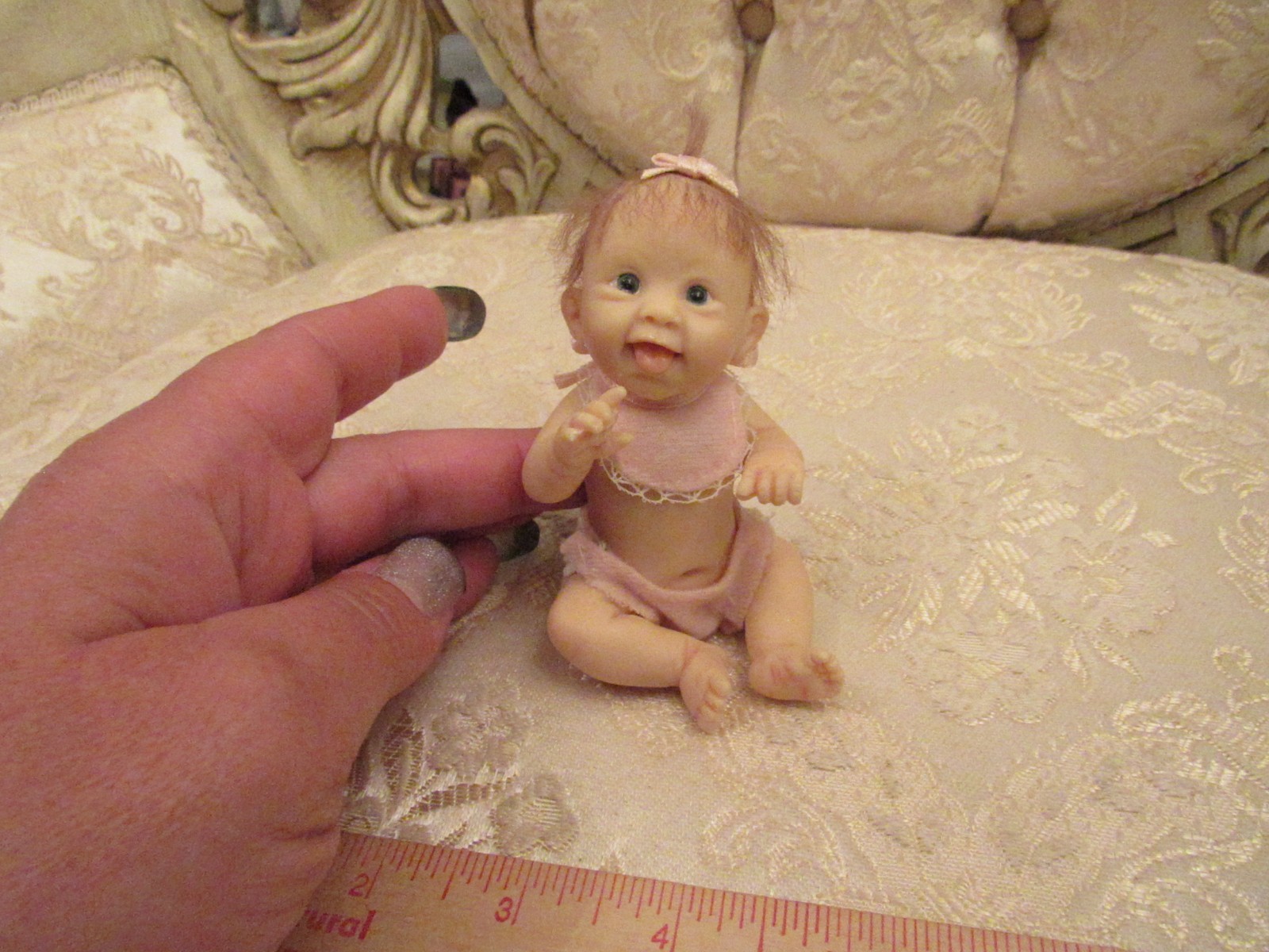 The Ashton-Drake Galleries Heavenly Handfuls Baby with Diaper and Bib