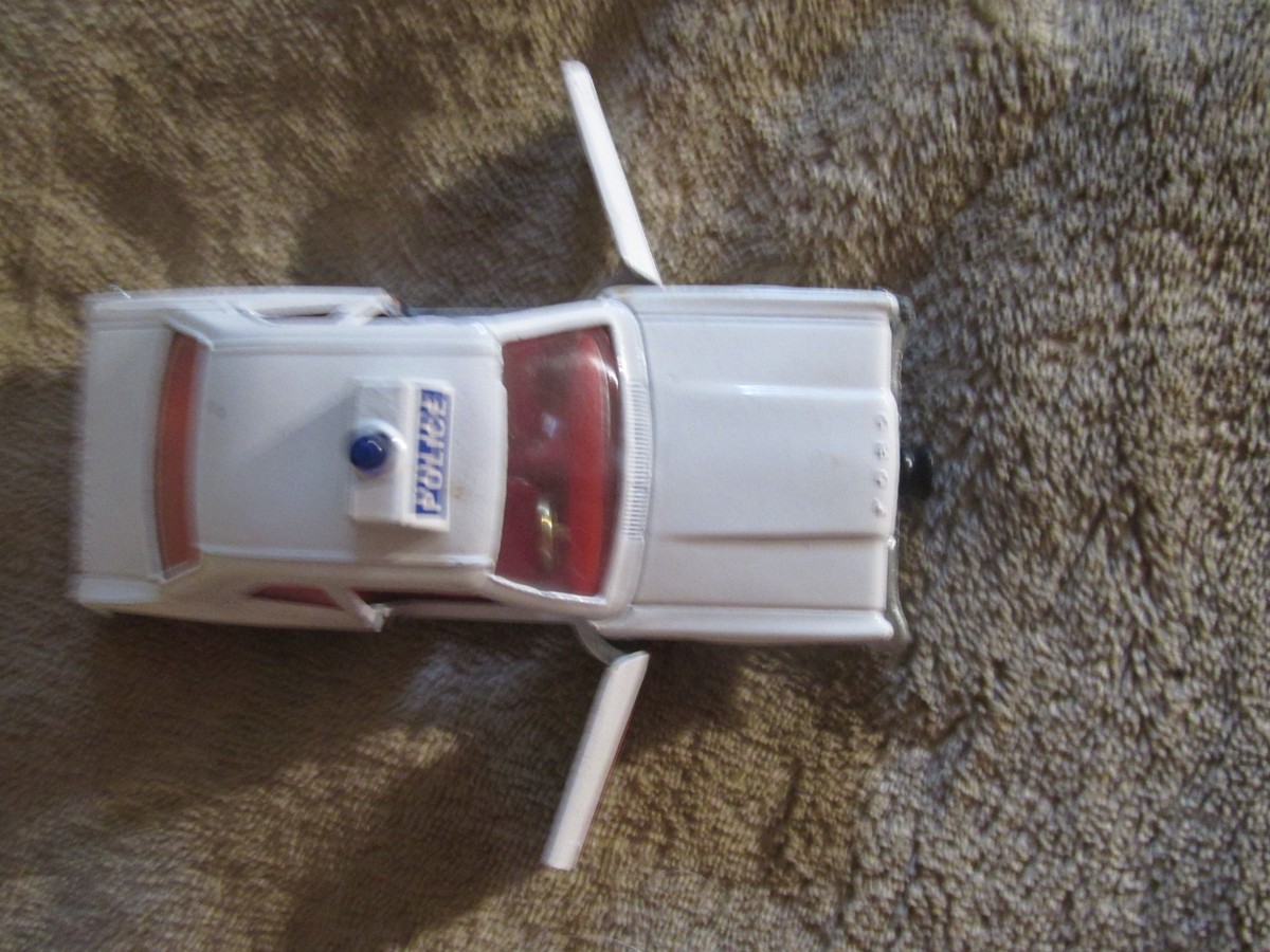 Vintage Corgi Toys Whizzwheels Ford Cortina GXL Police and a vigilant Range
