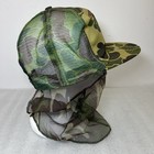 Green and black camo snapback hat with mesh front and dark green leaf pattern on top, USA made.