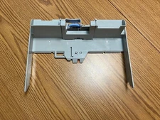 HP P/N RM1-1089 Paper Tray Rear Stop NEW not in Box but New Tape Still Intact