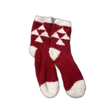 New red,white fuzzy holiday slipper socks feature a geometric diamond pattern