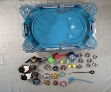 Beyblade Lot of 32 Beyblade Stadium And Customizable Beyblade Tops and Launchers