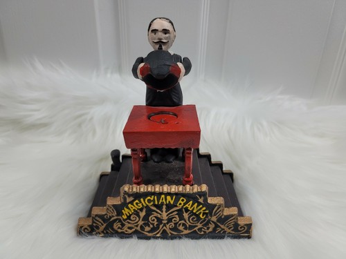 Mechanical Magician Cast Iron (Disappearing Coin) Bank - EUC - 第 1/8 張圖片