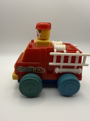 TOMY Pushin Go Fire Truck Toy Vehicle Red Blue Yellow for Ages 1-4