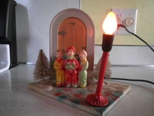 NOMA Wind Up Musical Door Carolers Light Glolite Christmas decoration 1949