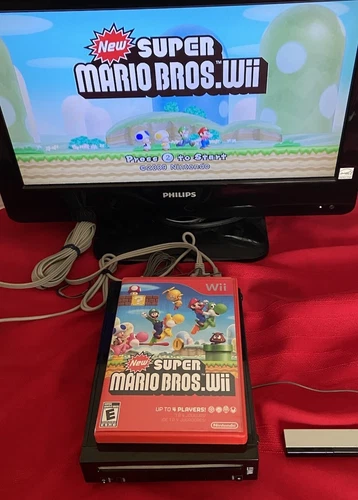 New Super Mario Bros. Wii (Nintendo 2009) CIB Complete with Manual Tested in VGC